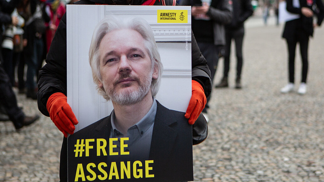 Acto de Amnistía Internacional pidiendo la liberación de Julian Assange